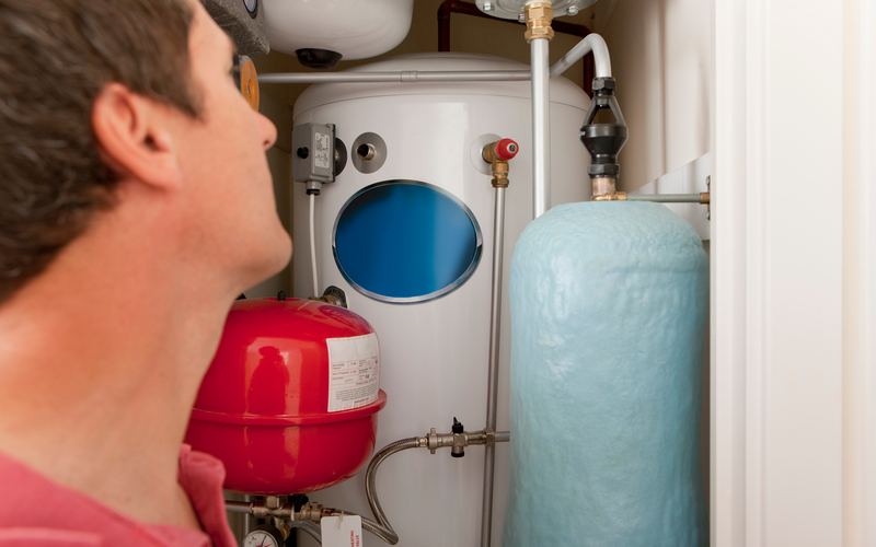 Hot water cylinder and heating system